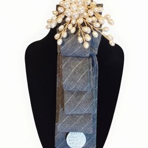 Elegant Gray Plaid Tie with Pearl Brooch